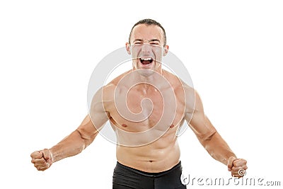 Muscular strong man fighter excited to win showing tighten muscles Stock Photo