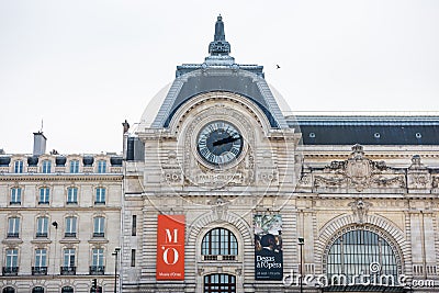 Musee d`Orsay or Orsay museum building facade with clock in a cloudy day in Paris, France Editorial Stock Photo