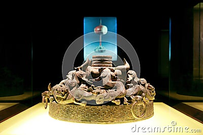 [Museum treasure 23]-Drum Stand With Openwork Coiled Dragon Design bronzeware.Shanghai Museum, China Editorial Stock Photo