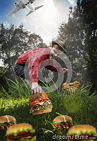 Mushroom collector collects only hamburgers Stock Photo