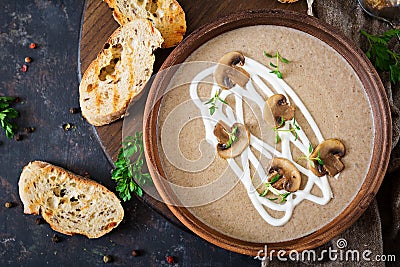 Mushroom cream soup. Vegan food. Dietary menu. Top view. Stock Photo