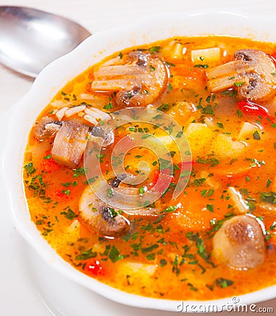 Mushroom soup with rice and vegetables Stock Photo