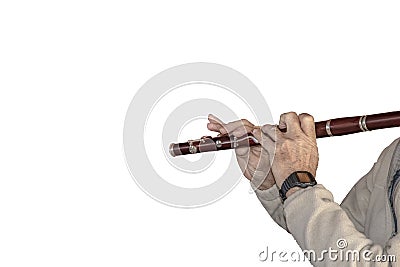 Music background - isolated on white - cropped unrecognizable senior man in fleece pullover plays a flute Stock Photo