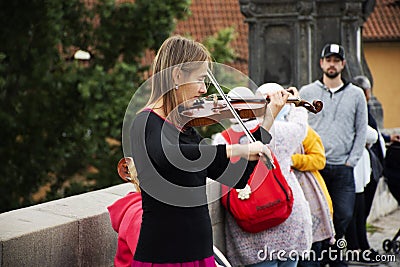 Music band of Czech women musician people playing music instrument violin and Violoncello or Cello for show people and travelers Editorial Stock Photo