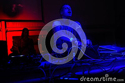 DJ Nightclub with Blue and Red Lights, Music Bliss, Rave - DJ Cazanova Editorial Stock Photo