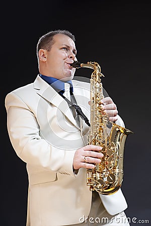 Expressive Mature Caucasian Male Saxophone Player Stock Photo