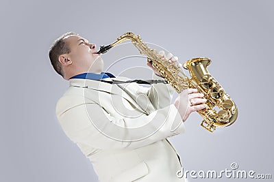 Music Concepts. Natural Portrait of Expressive Male Saxophone Mu Stock Photo