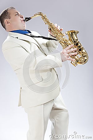 Music Concepts. Natural Portrait of Expressive Male Saxophone Mu Stock Photo