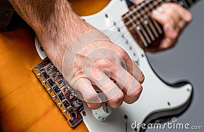 Music festival. Man playing guitar. Close up hand playing guitar. Musician playing guitar, live music. Musical Stock Photo