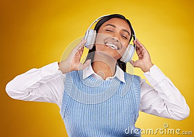 Music headphones, studio and happy woman listening to media sound track for fun, freedom and wellness. Energy, audio Stock Photo