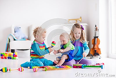 Music for kids, children with instruments Stock Photo