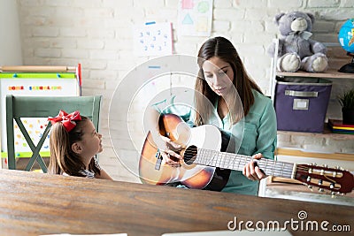 Music lessons at home Stock Photo