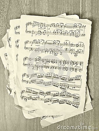 Music notes on old paper Stock Photo