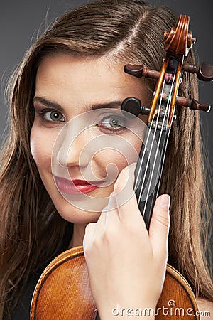 Music portrait of young woman. Violin play. Stock Photo