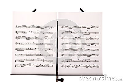 Music stand with melody sheets Stock Photo