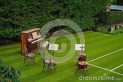 Musical background. Band stand setup on the lawn. Instruments are ready for performers Stock Photo