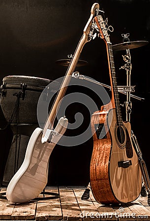 musical instruments, acoustic guitar and bass guitar and percussion instruments drums Stock Photo