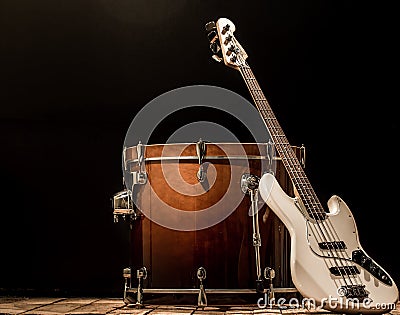 musical instruments, drum bass Bochka bass guitar on a black background Stock Photo