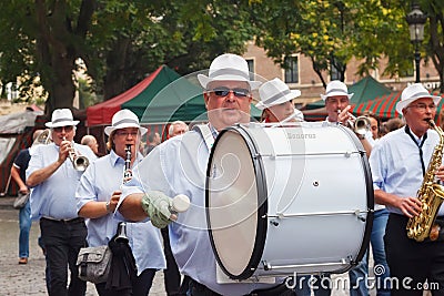 BRUSSELS, BELGIUM - SEPTEMBER 06, 2014: Musical procession in the center of Brussels during the Belgian Beer Weekend 2014. Editorial Stock Photo