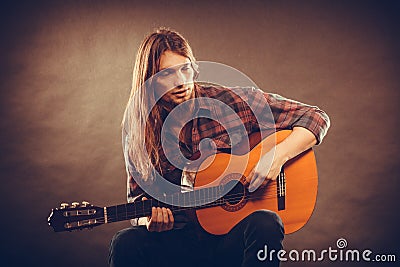 Musican and his instrument Stock Photo