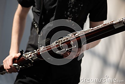 Musician playing the bassoon Stock Photo