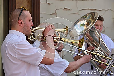 Musician play trumpet in Street Music Day Editorial Stock Photo