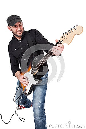 Musician playing electric guitar with enthusiasm. Isolated on white Stock Photo