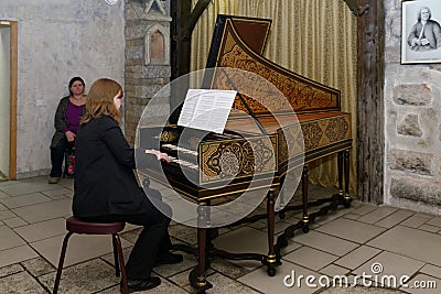 Musician plays the harpsichord Editorial Stock Photo