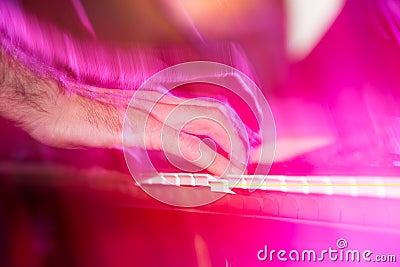 Musician plays keyboards in a rock band Stock Photo