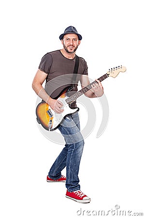 Musician smiling, playing electric guitar with enthusiasm. Isolated on white Stock Photo