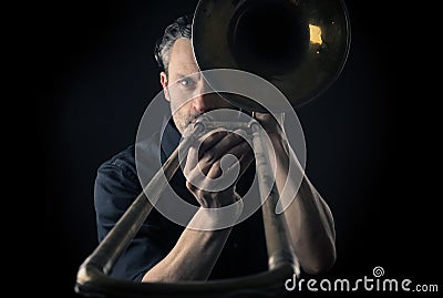 Musician with a trombone Stock Photo