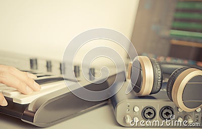Musician is using Portable Home Music studio production Stock Photo