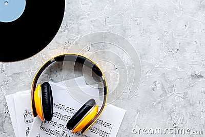 Musician work set with paper with notes and vynil stone table background top view space for text Stock Photo