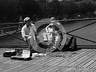 Musicians playing in Paris Editorial Stock Photo