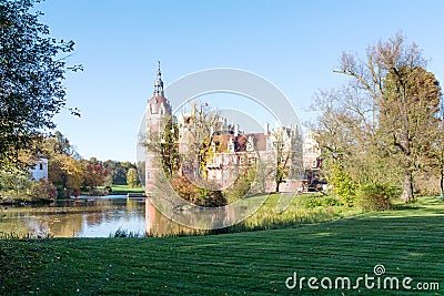 Muskau Palace reflected in the lake in the Lusatia Stock Photo