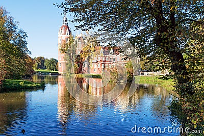 Muskau Palace reflected in the lake in the Lusatia Stock Photo