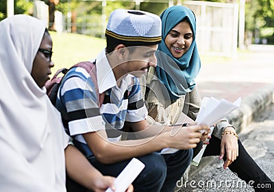 Muslim boy and girls studying outdoor Stock Photo