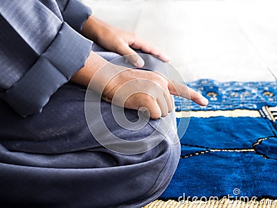 Muslim child praying for Allah Stock Photo