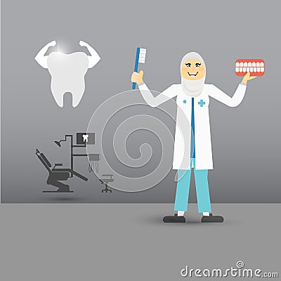 Muslim Dentist holding a teeth model and toothbrush Stock Photo