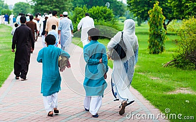 Muslim family going for Eid prayers, Lahore, Pakistan Editorial Stock Photo