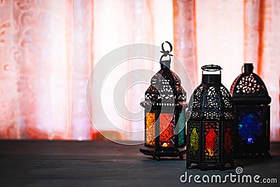 The Muslim feast of the holy month of Ramadan Kareem. Beautiful background with a shining lantern Fanus Stock Photo