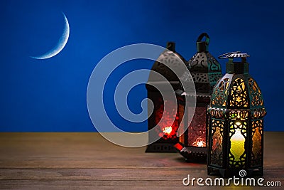 The Muslim feast of the holy month of Ramadan Kareem. Beautiful background with a shining lantern Fanus Stock Photo