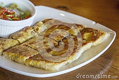 Muslim food Martabak or murtabak (Stuffed pancake) Stock Photo