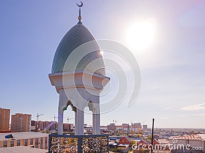 A Muslim golden dome with a crescent moon on the mosque. Minaret against the sky. Arab day. Islamic symbols of religion. Faith in Editorial Stock Photo