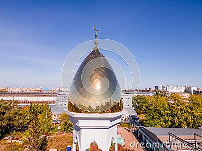 A Muslim golden dome with a crescent moon on the mosque. Minaret against the sky. Arab day. Islamic symbols of religion. Faith in Editorial Stock Photo