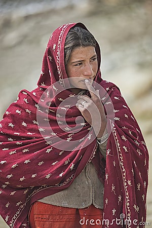 The Muslim Ismaili girl from Upper Shimshal village 5600m is sad after the relatives left for the lower Shimshal village 3100m. Th Editorial Stock Photo