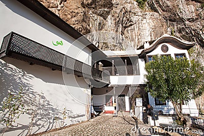 Muslim man educated in Islam - Mullah, calls to pray on a balcony of beautiful Sufi monastery Editorial Stock Photo