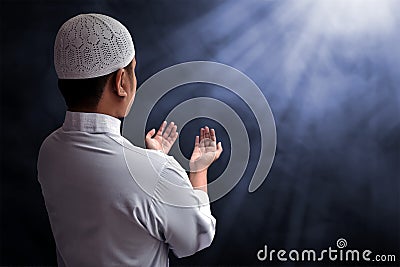 Muslim man praying Stock Photo