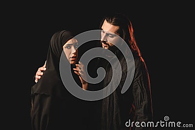 Man embracing worried wife isolated on Stock Photo
