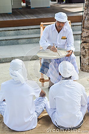 Muslim orthography teacher giving lesson to his students Editorial Stock Photo